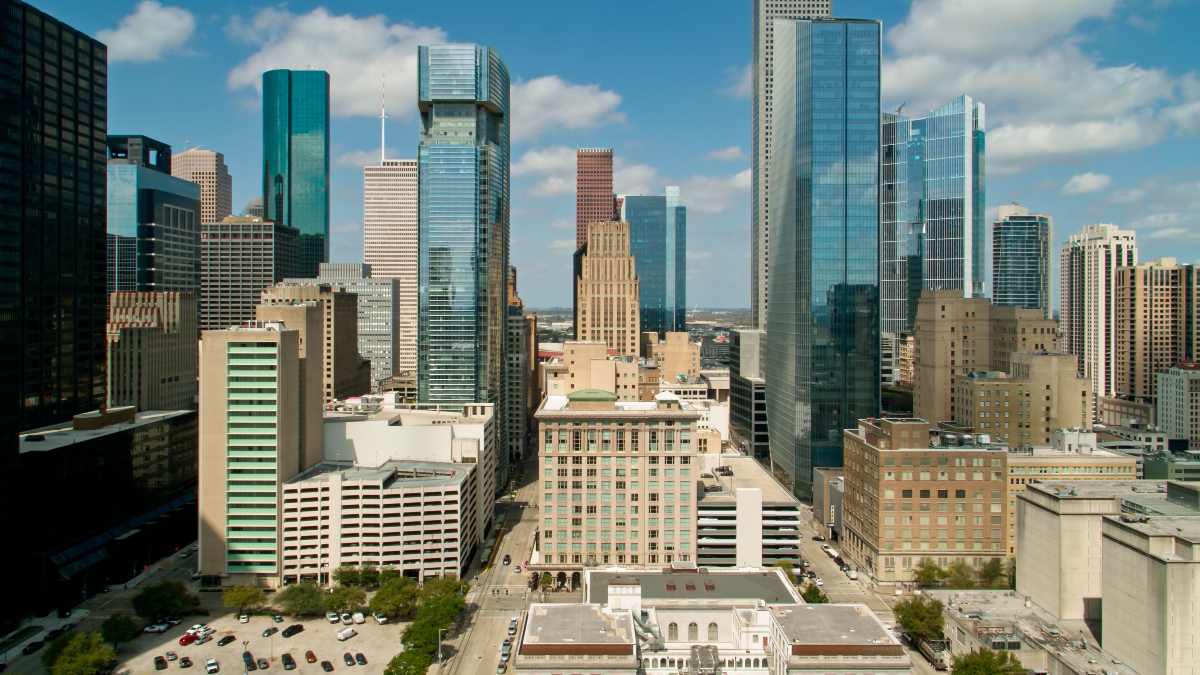 Aerial shot of downtown office buildings in Houston, Texas on a sunny afternoon.

Authorization was obtained from the FAA for this operation in restricted airspace.